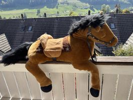 Plüschpferd braun mit Sattel und Zaumzeug guter Zustand