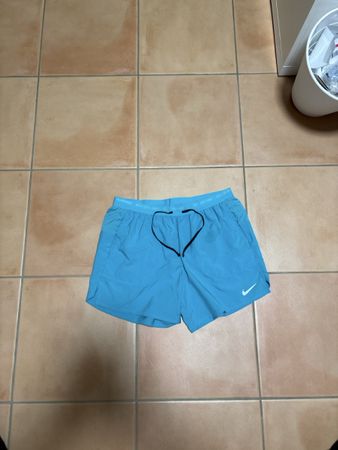Short Nike Stride Dri-Fit Bleu Clair Taille L bon état