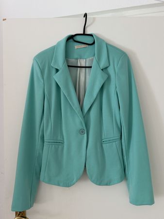 Veste turquoise taille M bon état