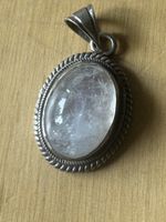 Pendentif vintage en argent avec pierre blanche fait  la man