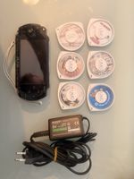 PSP + 5jeux UMD + 1 film UMD + chargeur