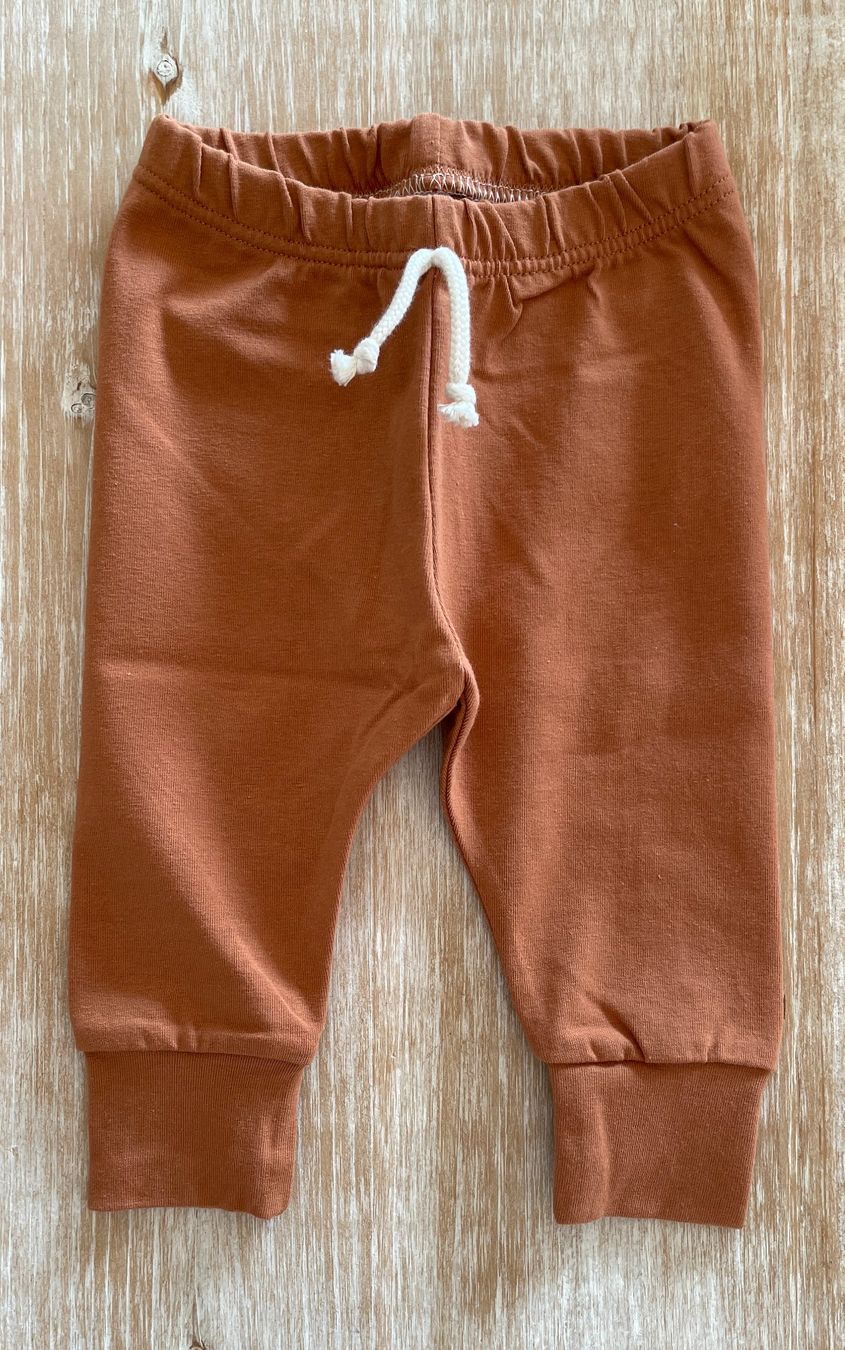 Pantaloni: Babyleggins rostrot, Grösse 56 – Nuovo e nell'imballaggio originale da Burgdorf venduto da Crown.