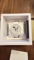 Omega x Swatch Moonshine Gold Bioceramic Watch