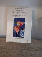 Jeu de tarot et livre 