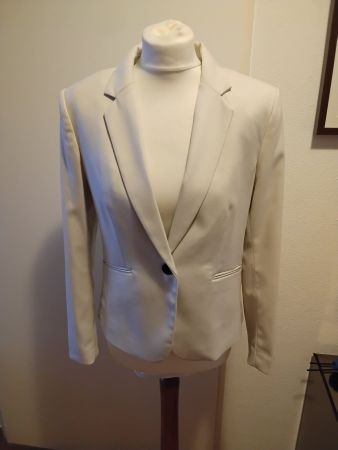 Blazer H&M beige crème taille 42, parfait pour le printemps!