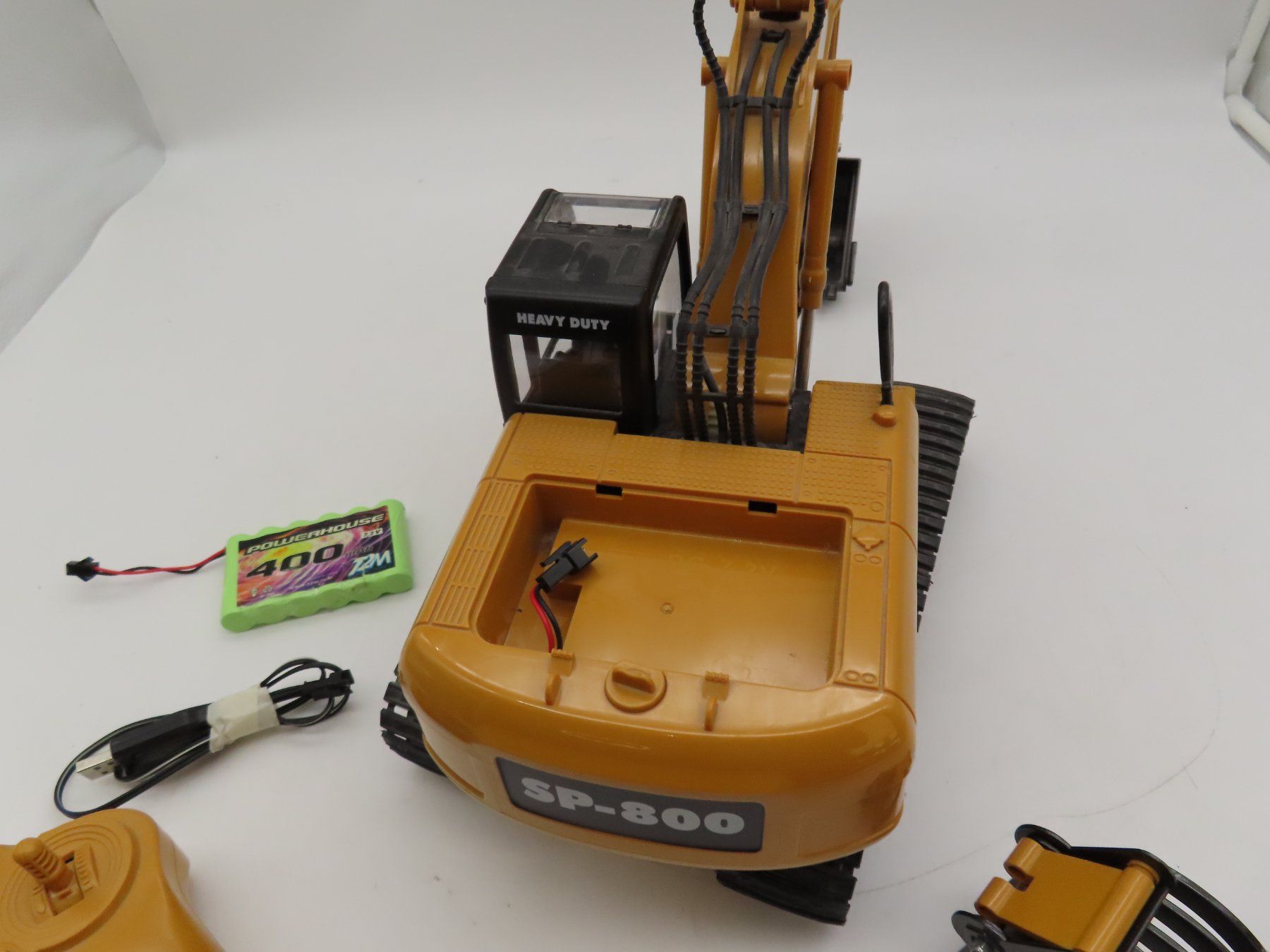 Giocattoli: Spielzeug Bagger RC (ungetestet) – Usato da Reinach BL venduto da WBZ-Flohmarkt 3