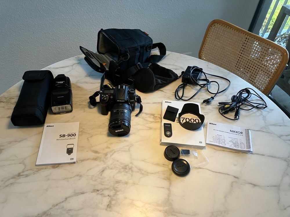 Nikon Fotocamera: Nikon D7000 Kamera mit Zubehör Set – Usato da Berneck venduto da Stegi1