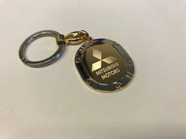 Mitsubishi Schlüsselanhänger oval 40 x 32mm Logo eingelasert
