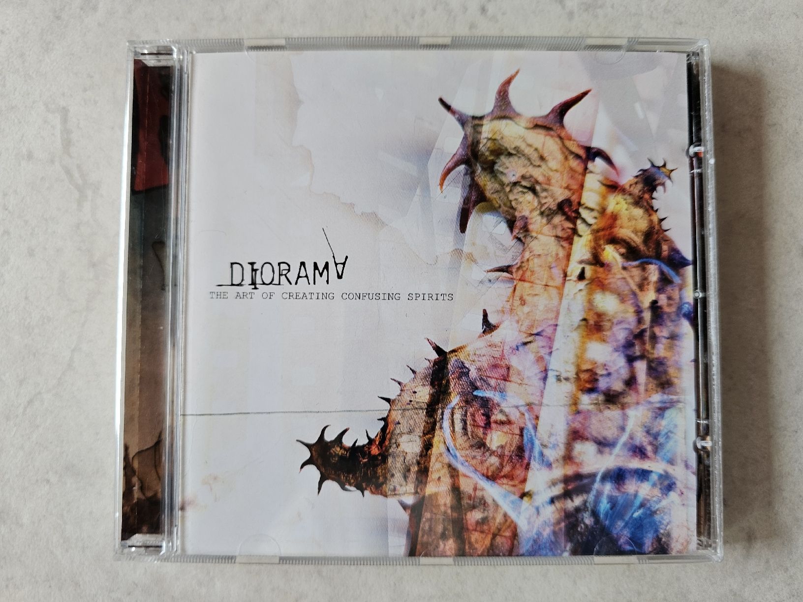CD: Diorama  -  The Art Of Creating Confusing Spirits – Usato da Schneisingen venduto da backstore24