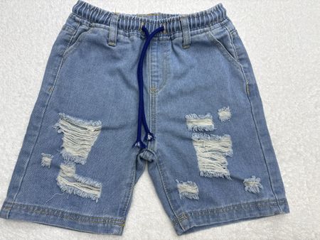 Shorts en jean déchirés taille 9 ans bon état