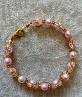 Handmade beaded bracelet pink and gold, 18,5 cm long