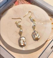Boucles d'oreilles faits main ( perles Baroque) 