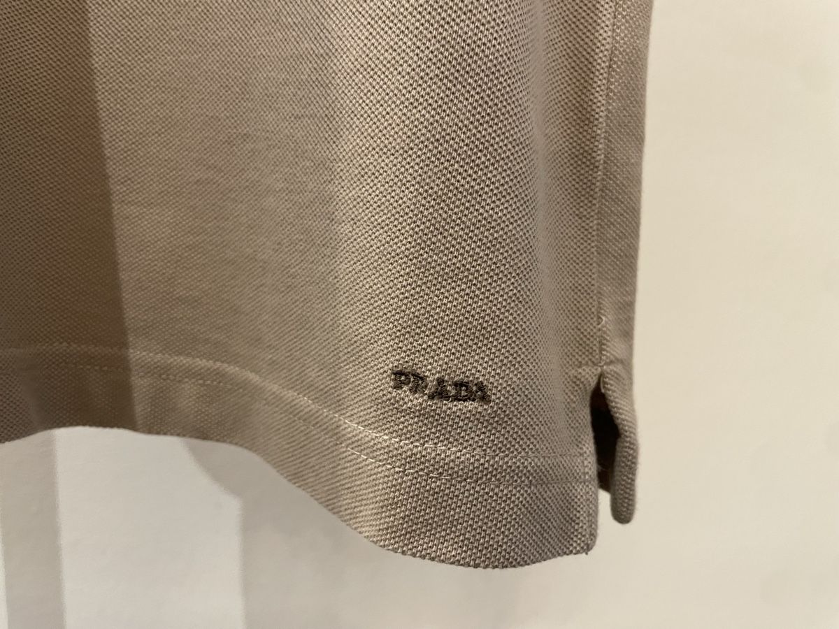Prada Magliette Polo: Prada Polo-Shirt Beige – Usato da Windisch venduto da rascale 3