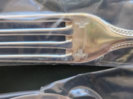 Couverts Christofle, modèle Perles, métal argenté, 51 pièces