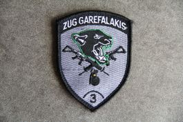 Zug Garefalakis 3, Zugs-Badge mit Klett