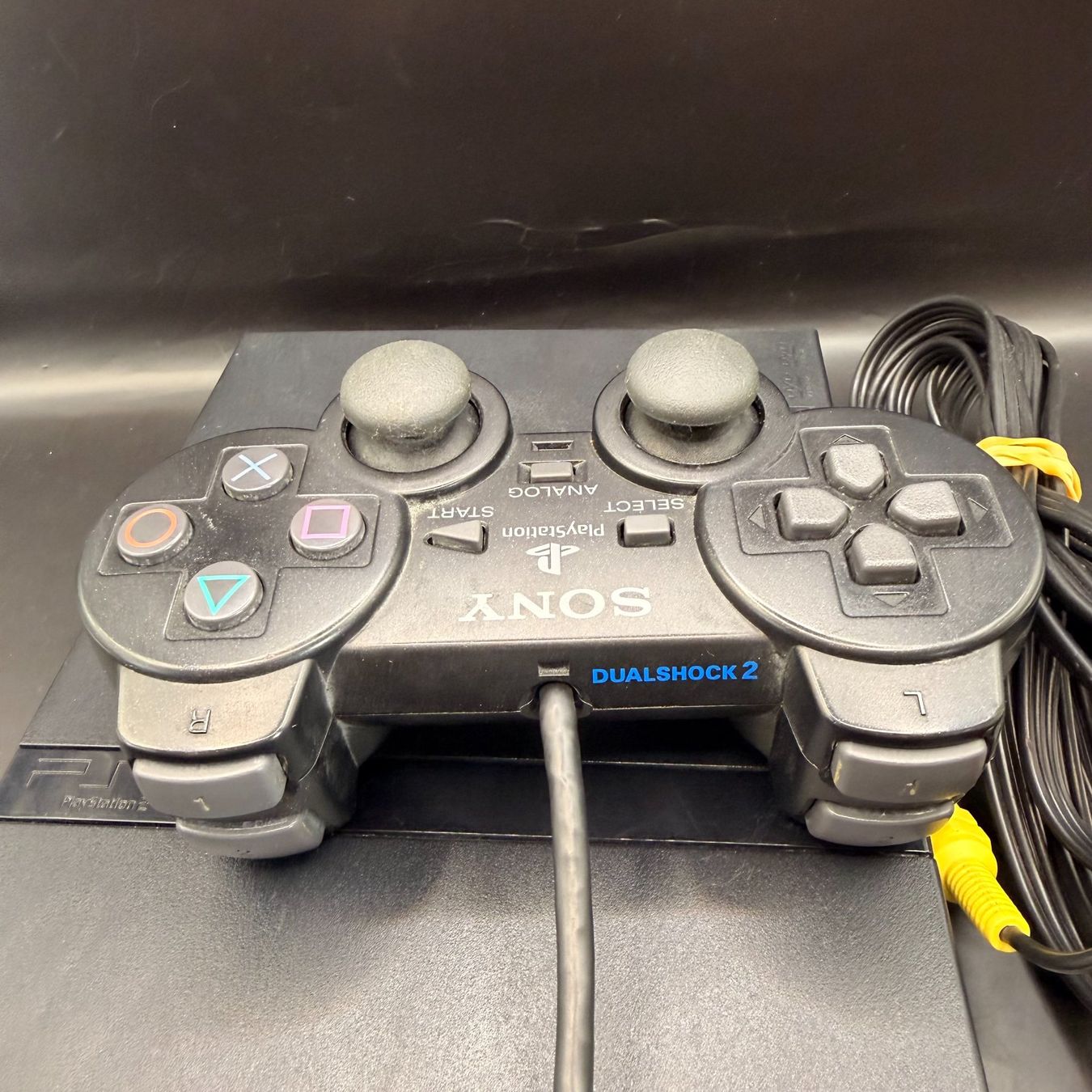 Sony Console: Sony PlayStation 2 PS2 Slim Schwarz – Usato da Düdingen venduto da Nerdworld 2
