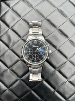 Silberne Uhr aus Edelstahl, elegant, unisex