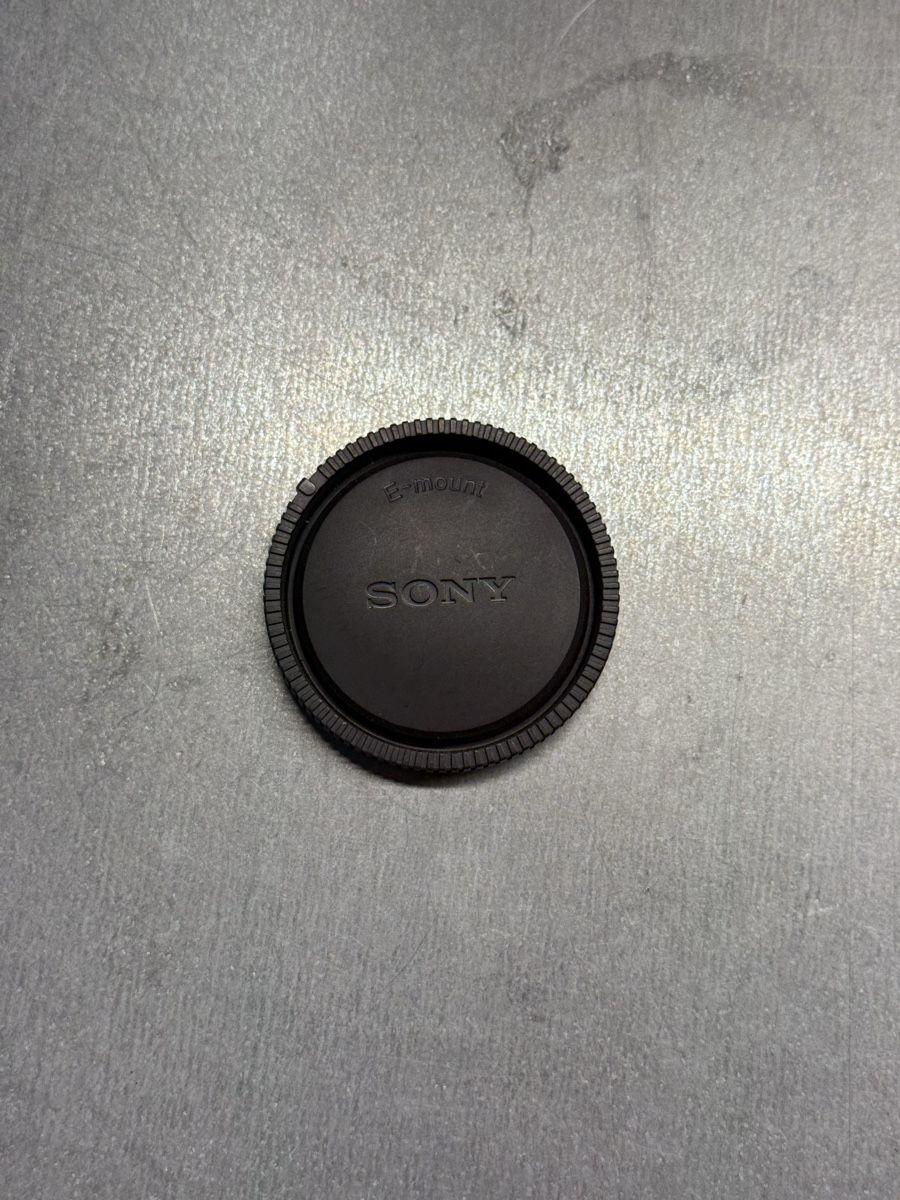 Sony Objectifs: Sony E-mount Objektivdeckel Schwarz neuwertig – Neuf (Voir description) à Chur par ursgu01