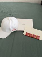 Casquette officielle Omega + catalogue de collection