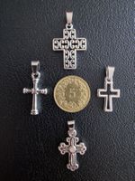 4 croix argentées, + trèfle à 4 feuilles