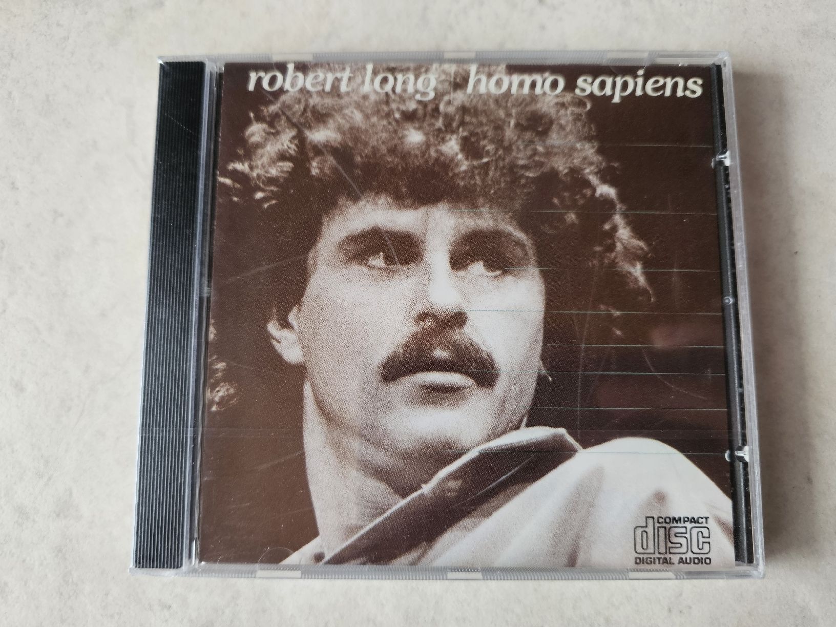 CDs: Robert Long  -  Homo Sapiens  /  Fabrikneu – Neu und originalverpackt aus Schneisingen von backstore24