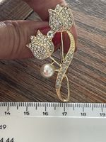 Jolie broche dorée vintage brillants et perles neuve