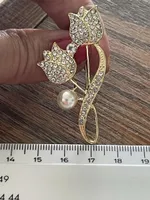 Jolie broche vintage dorée neuve