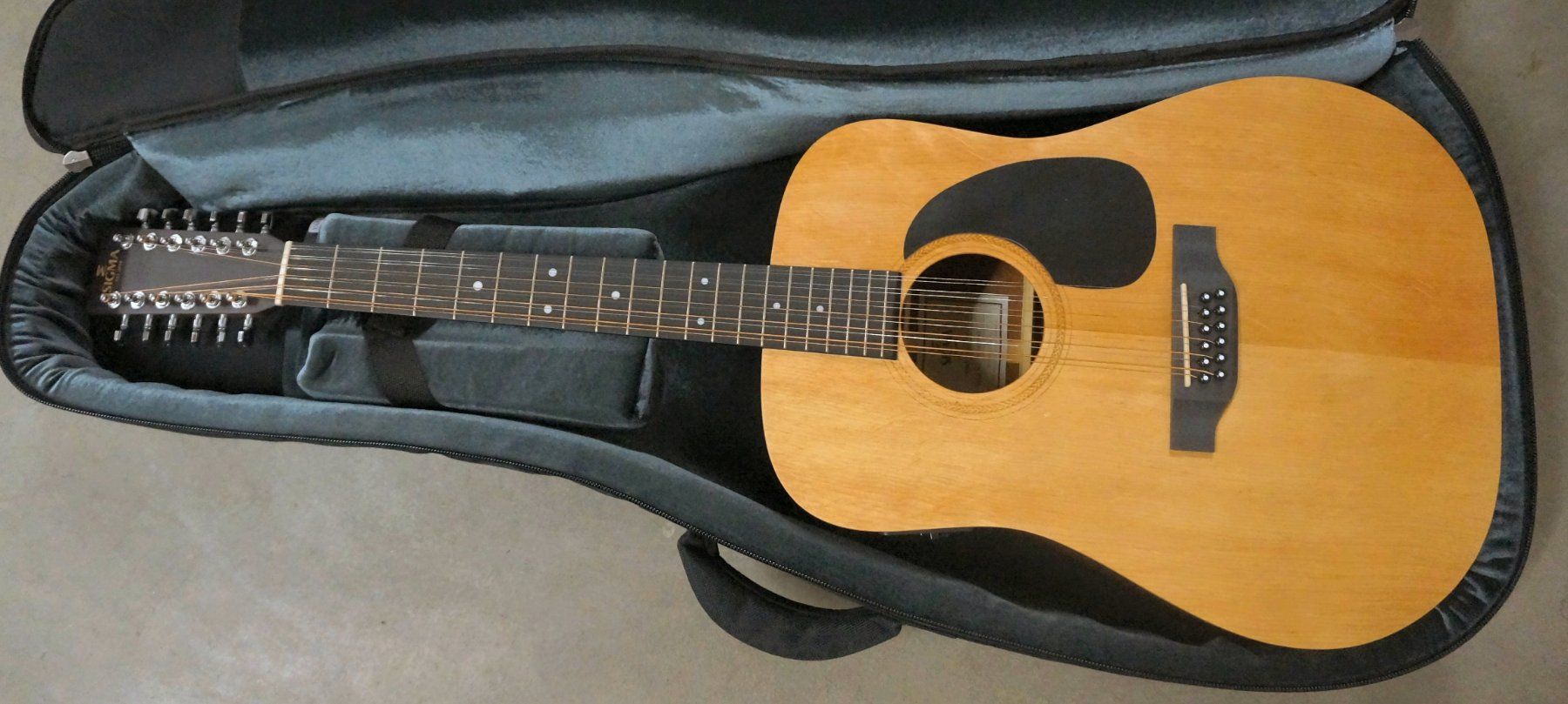 Sigma Strumenti musicali: BEAUTY Sigma Acoustic-Electric Guitar - 12-String!!!!! – Difettoso da Zofingen venduto da Rodeln