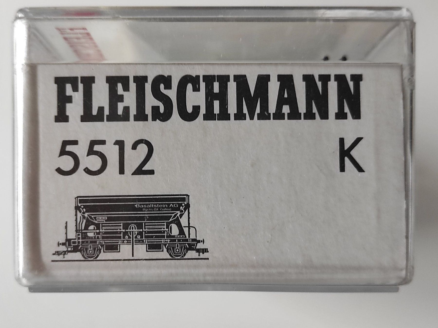 Fleischmann Modellini di ferrovie: Kieswagen "Basaltstein AG Buchs" der SBB von Fleischmann H0 – Nuovo e nell'imballaggio originale da La Chaux-de-Fonds venduto da Hobbymodell 1