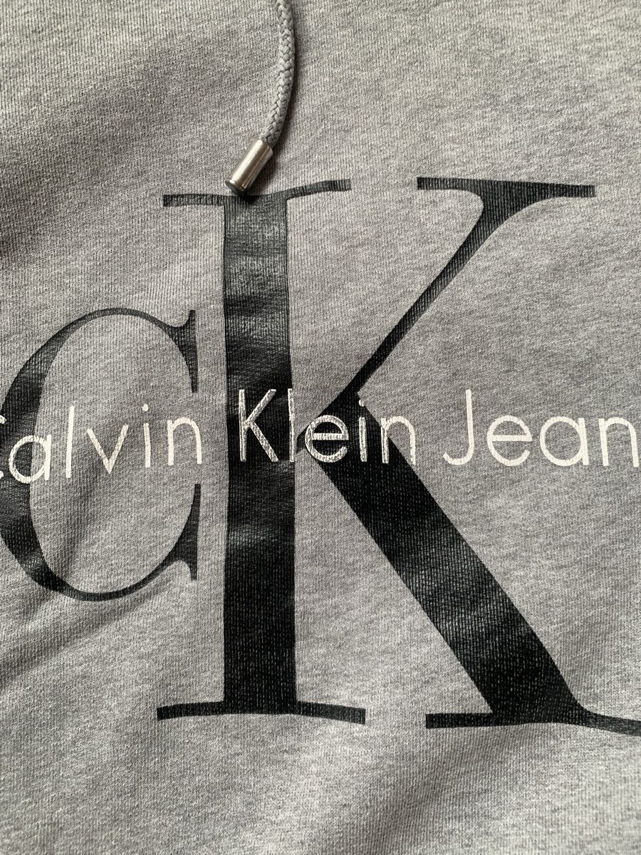 Calvin Klein Maglioni & Felpe: Original Calvin Klein Jeans Kapuzenpullover Grau Gr. M – Usato da Ellikon an der Thur venduto da Bali1999 2