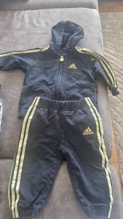 Adidas Trainingsanzug schwarz gold 