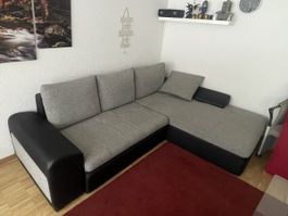 Schwarz/grau Ecksofa in gutem Zustand