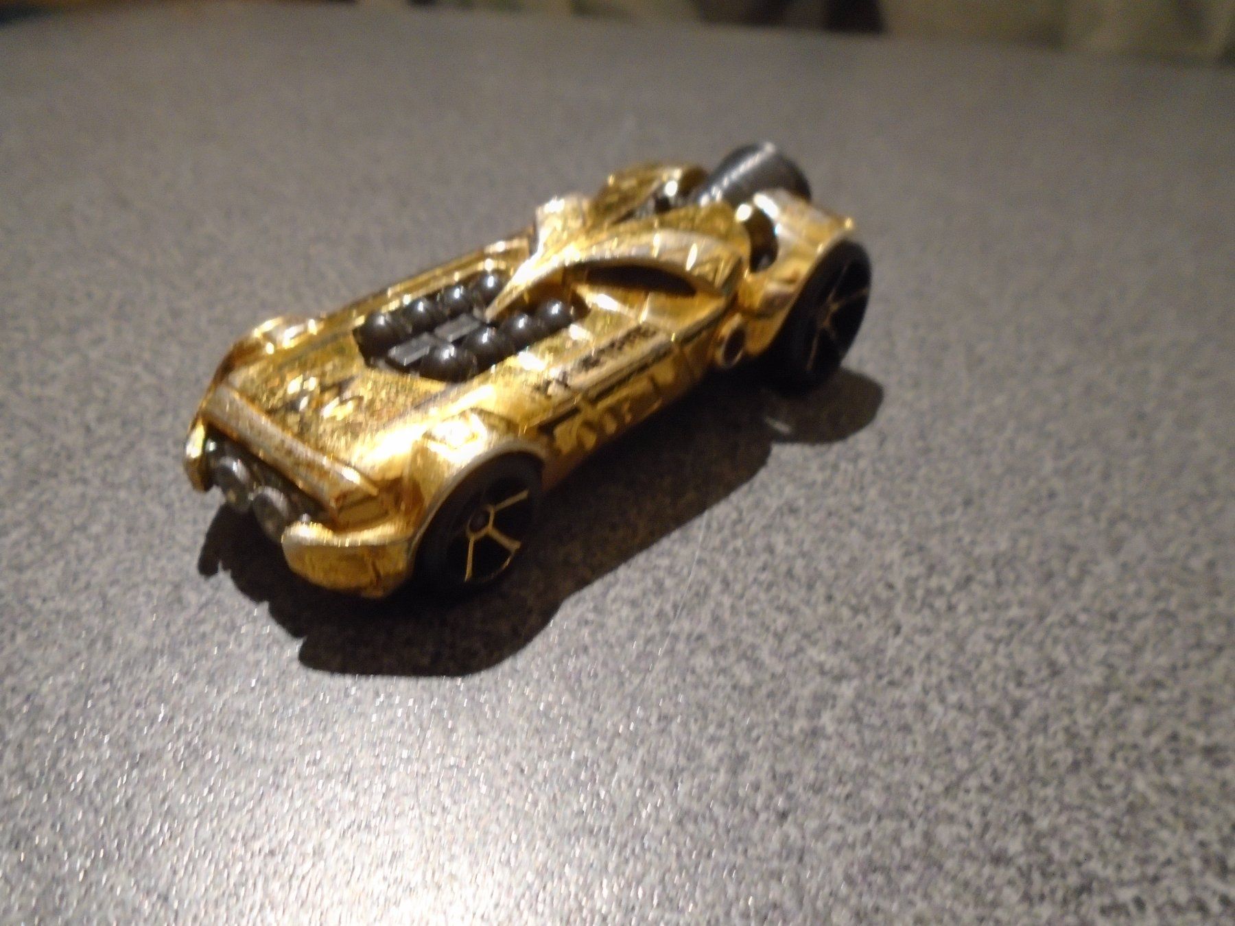 Spielzeuge: Spielzeugauto Rocket Fine, goldfarbig – Gebraucht aus Zürich von abraxas1291