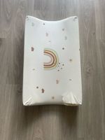 Wickelunterlage mit Regenbogen Motiv, beschädigt