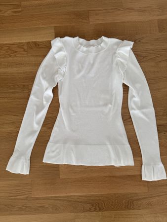 Elegantes, weisses Langarmshirt mit Rüschen von H&M (XS)