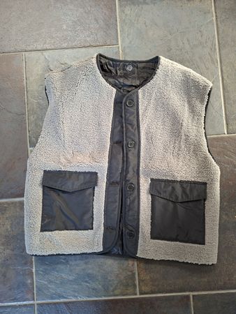 Gilet polaire doublé noir chaud parfait pour l'entre-saison 