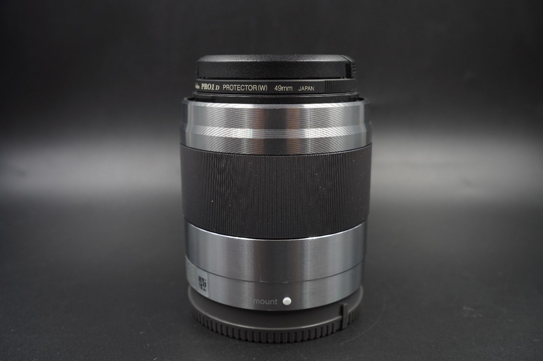 Sony Objektive: Objektiv Sony E 1.8/50 OSS SEL50F18 silber gebraucht APSC – Gebraucht aus Niederhasli von Adrianson
