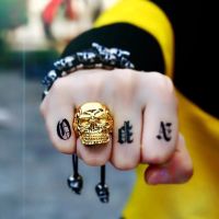Men gold skull ring