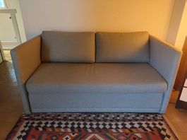 Fauteuil convertible gris quasi neuf