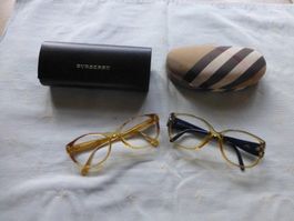 zwei Brillengestelle mit Etuis (C. Dior & Burberry)