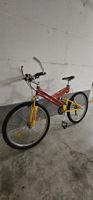 Bicicletta mountain bike rossa telaio giallo usata