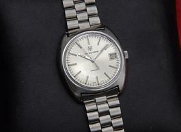 Montre Universal Genève Unisonic Date 1971, def. de 1.00 CHF
