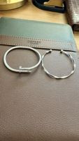 Set aus 2 silberfarbenen Armbändern aus rostfreiem Chirurgen