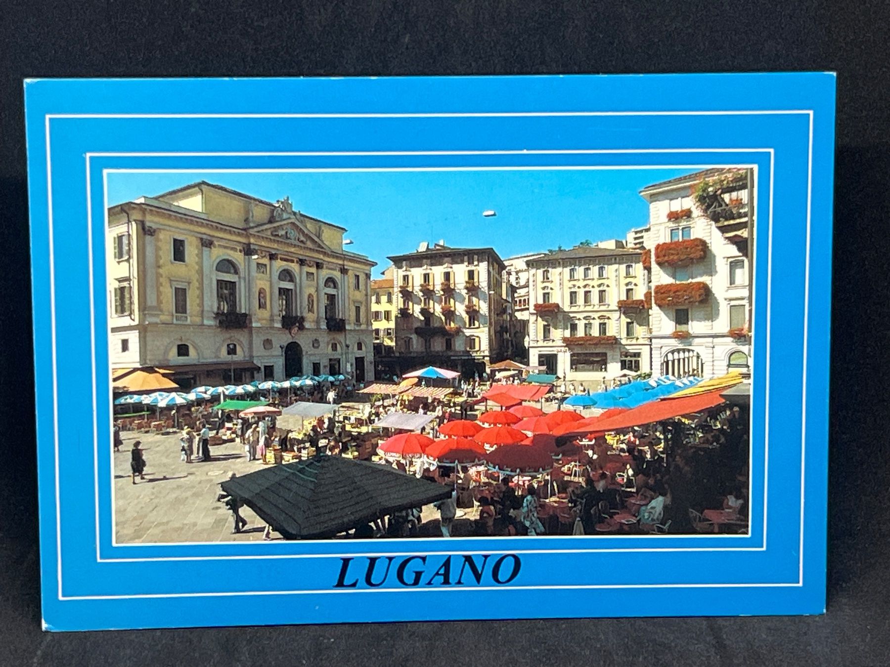 Cartoline postali: Lugano Pzza Riforma con Mercato – Usato da Widnau venduto da Brusi9