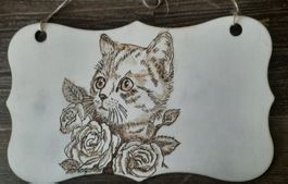 Kätzchen in Blumen