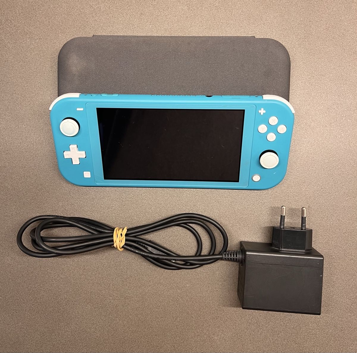 Nintendo Konsolen: Nintendo Switch Lite - Türkis - Inkl. Ladegerät & Tasche – Gebraucht aus Wangen an der Aare von gismoluna01