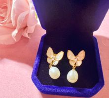 Boucles d'oreilles papillon nacré et perle