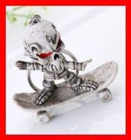 Schlüsselanhänger Skateboard Skelett Schädel Skull Kickflip