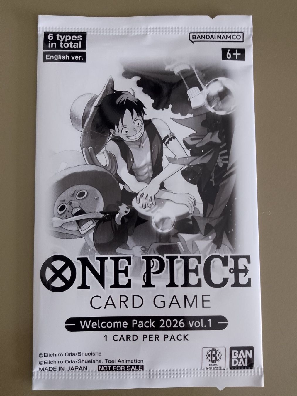 Bandai Sammelbilder & Trading cards: One Piece 1x Welcome Pack 2026 Volume 1 Englisch – Neu und originalverpackt aus Jona von Stack