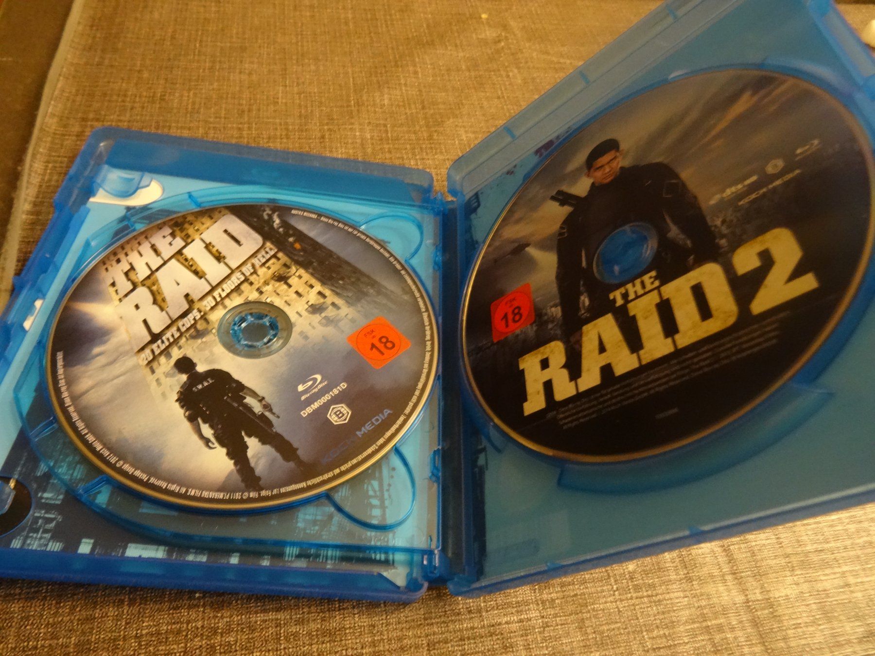 Alle DVDs: The Raid Evolution Trilogie Blu-ray 3 Filme – Gebraucht aus Olten von Disc-Verkauf 4